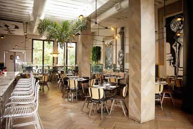 Private dining room in Norah with modern decor, perfect for intimate events and meetings.