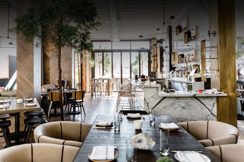 Private dining room at Norah, featuring elegant furnishings for upscale events and meetings.