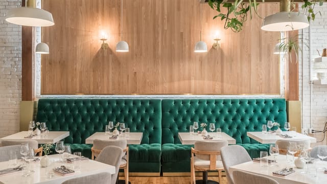 Stylish Green Room at The Mint LA with plush seating, ideal for corporate events and gatherings.