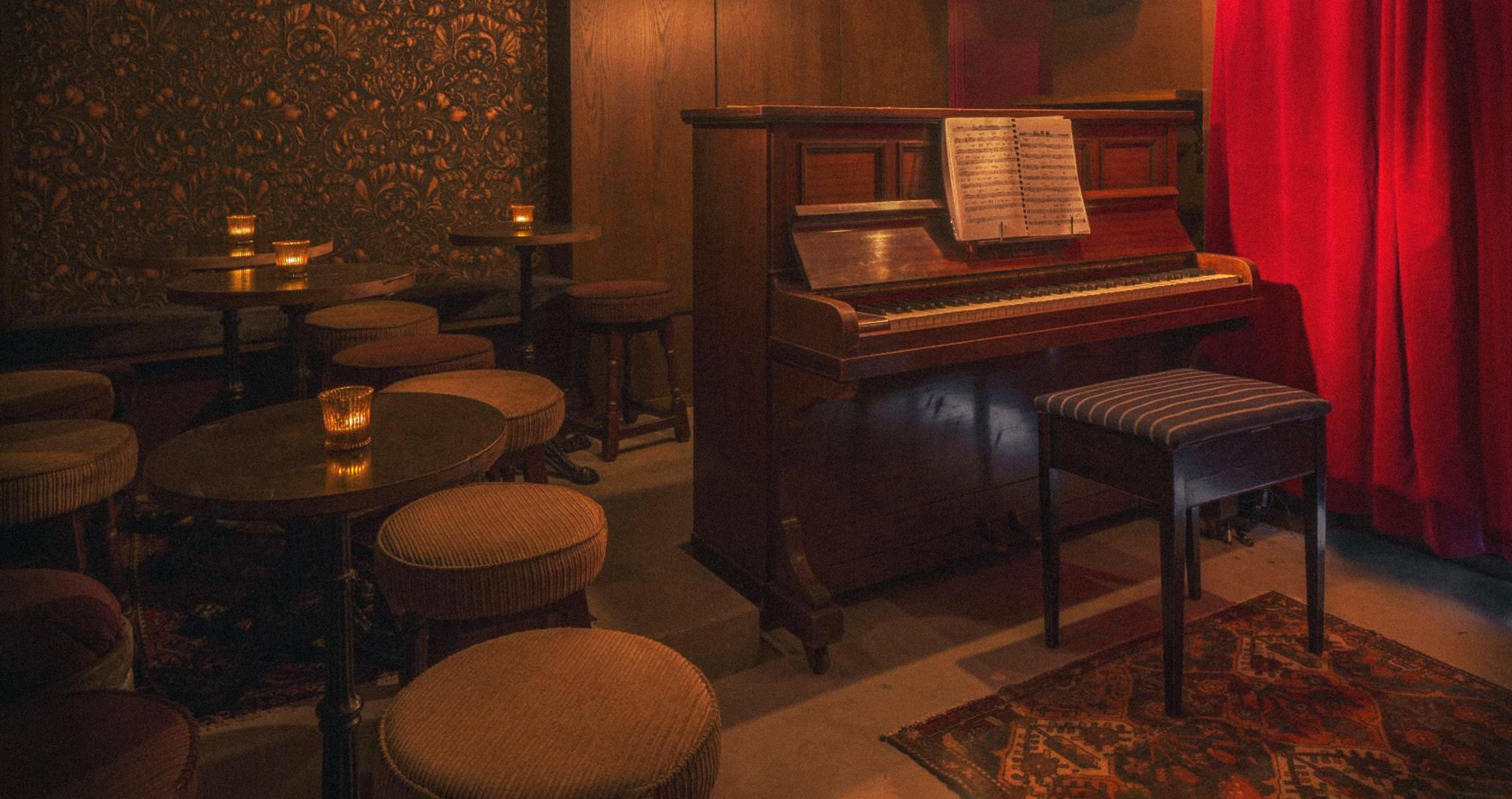 Cozy Green Note venue with warm lighting, ideal for private events and live music.