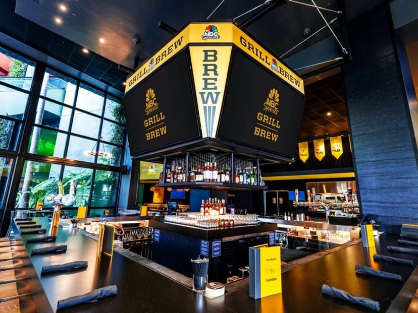 Modern bar area at Universal Bar & Grill, perfect for social events and casual meetings.