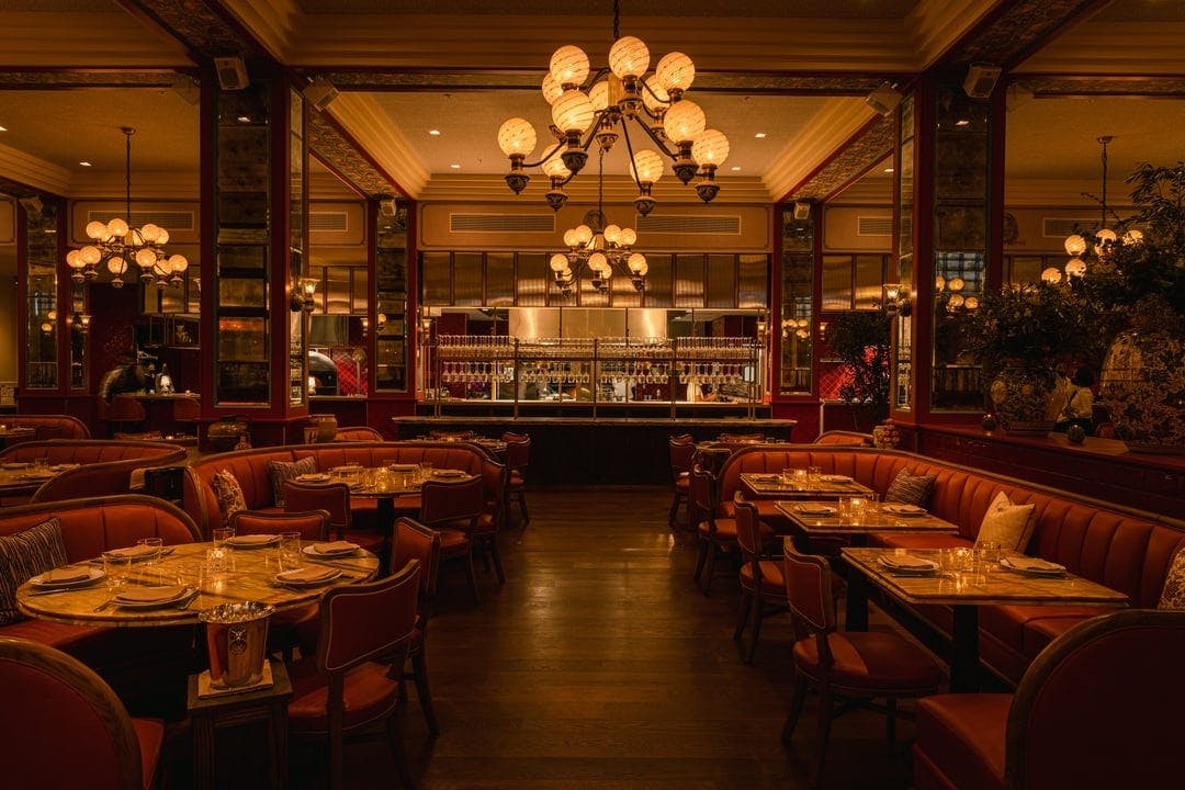 Elegant dining room with warm lighting, perfect for upscale events and intimate gatherings.