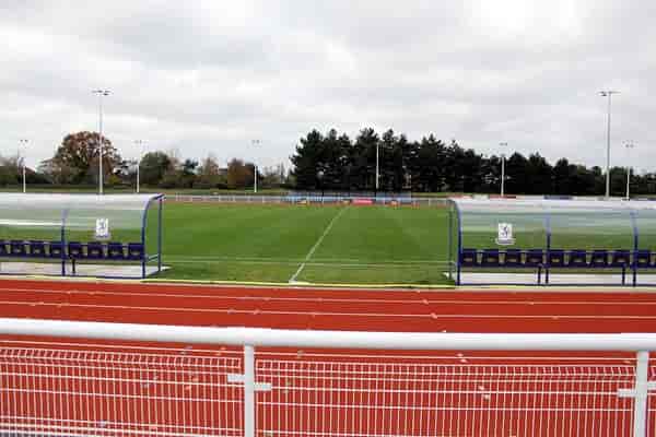 Main Stand Seating at Enfield Town FC, ideal for outdoor events and team-building activities.
