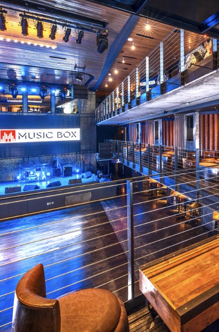VIP sections at Music Box San Diego, featuring stage lighting for live events and gatherings.