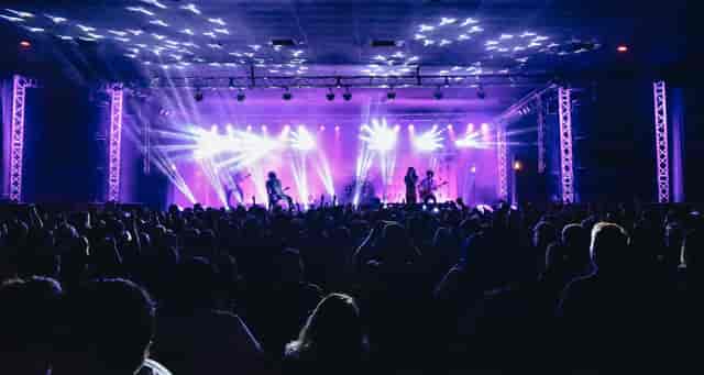Vibrant concert scene at Side Stage, SOMA San Diego with dynamic lighting and engaged audience.