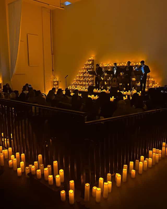 Elegant event space with candlelight, ideal for concerts and private parties.