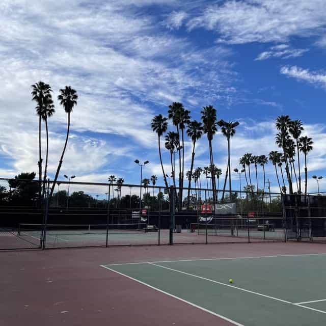 Outdoor tennis courts at Balboa Tennis Club, ideal for corporate retreats and team-building.
