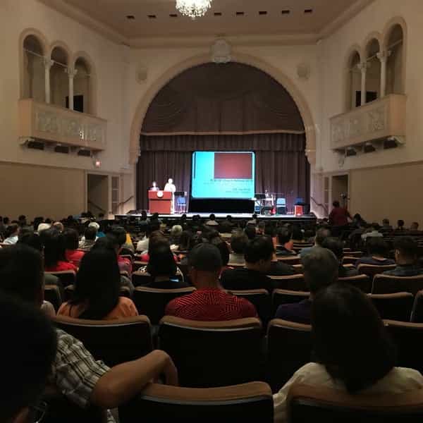 Shiley Theater auditorium setup for a presentation with audience engagement.