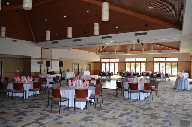 Nautilus Banquet Room with round tables, ideal for events and gatherings in Coronado.