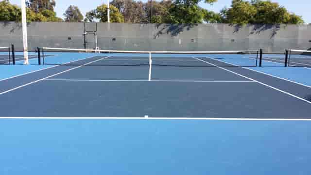 Tennis court at Linda Vista Recreation Center for outdoor events and team-building activities.
