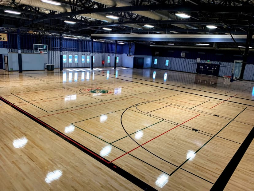 Spacious gymnasium with polished floors for sports events and gatherings in Golden Hill.