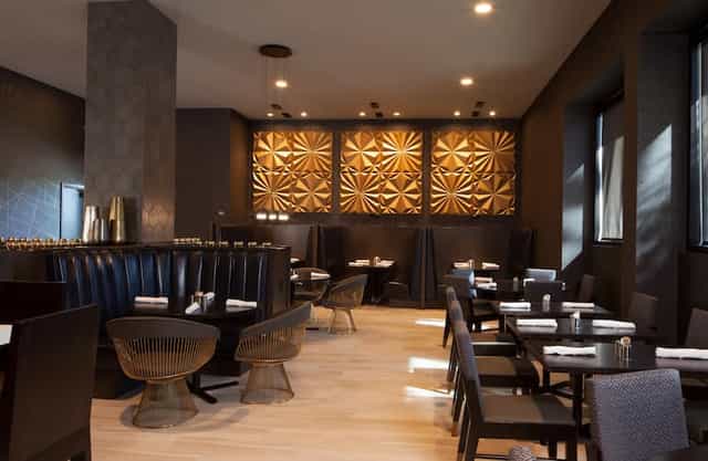 Modern dining space at H Hotel LA, ideal for intimate events and corporate meetings.
