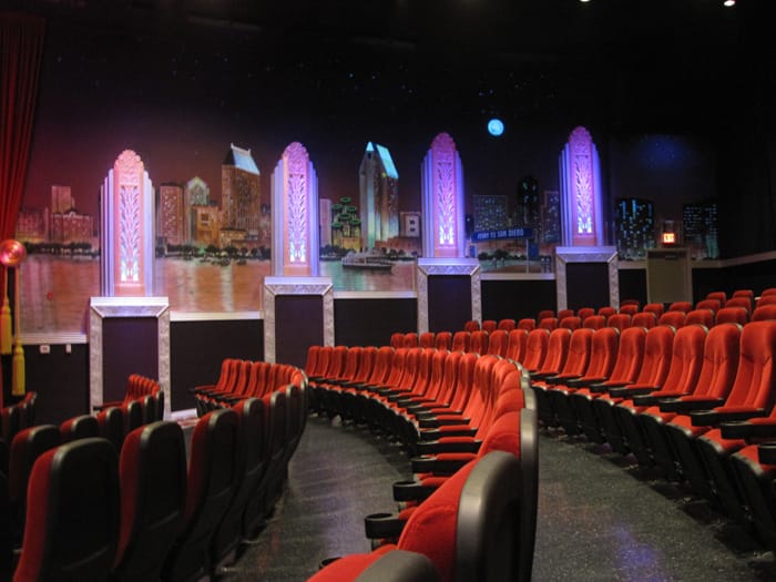 Main Screening Room at Village Theater with plush red seating, perfect for film screenings and events.
