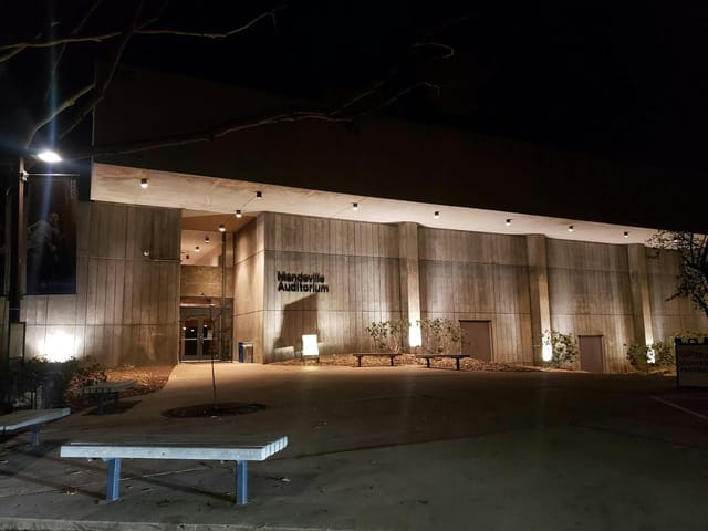 Modern Mandeville Auditorium basement, well-lit venue for conferences and performances.