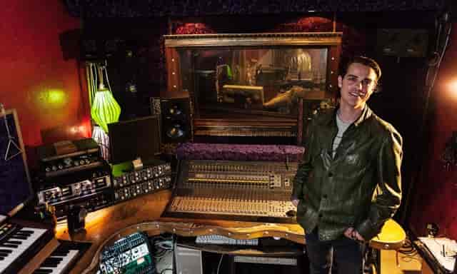 Creative music studio with vibrant decor, perfect for intimate events and workshops.