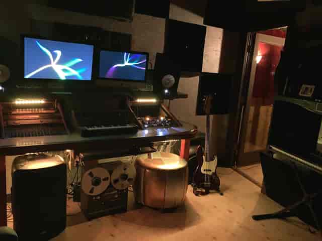 Alt text: "Capricorn Studios' Studio B with dual monitors, ideal for music events and workshops."