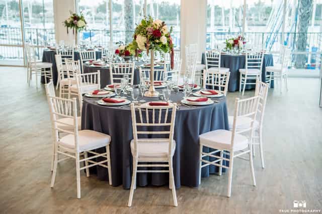Elegant indoor reception space with navy tables, ideal for weddings and corporate events.