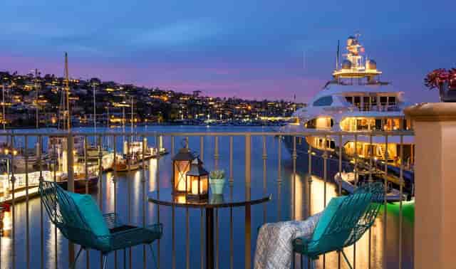 Kona Kai Resort waterfront courtyard with twilight lighting, ideal for upscale events.