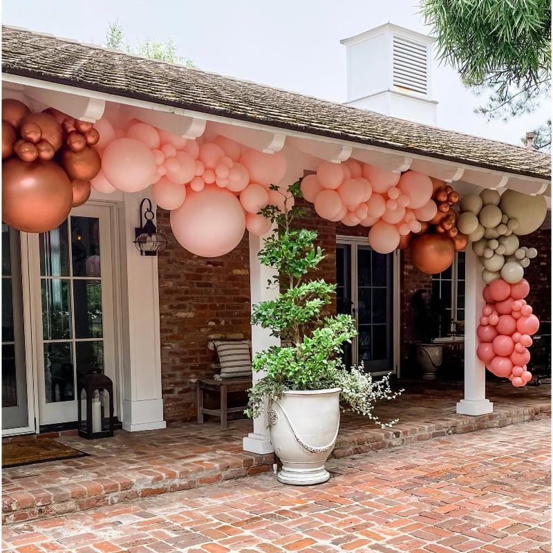 Pastel balloon arch for outdoor weddings and garden parties decoration.