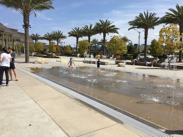 Splash Pad at Civita Park, vibrant water features for family-friendly summer events.