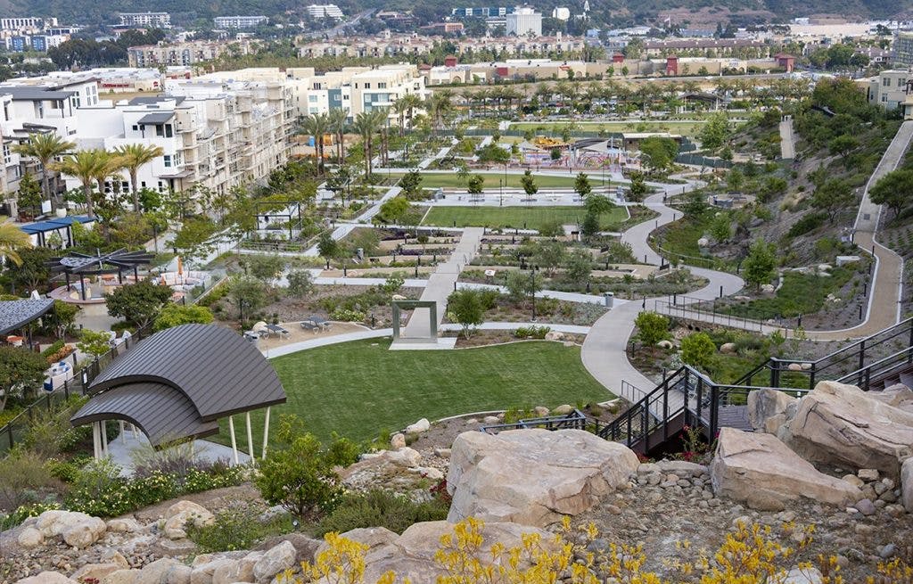 Splash Pad at Civita Park, lush greenery, ideal for outdoor events and gatherings.