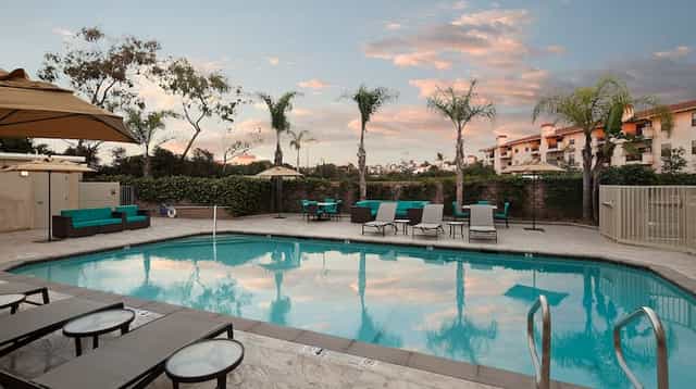 Serene pool area at Tapestry Collection by Hilton, ideal for outdoor events and networking.