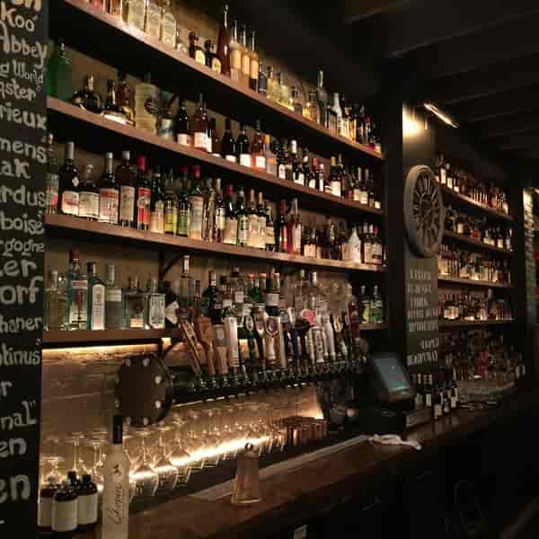 Whiskey Club bar with extensive spirits selection, perfect for events and receptions.