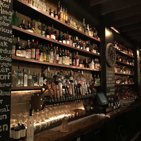 Whiskey Club bar with extensive spirits selection, perfect for events and receptions.
