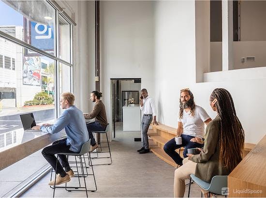 Modern open-concept reception space with natural light for networking events.