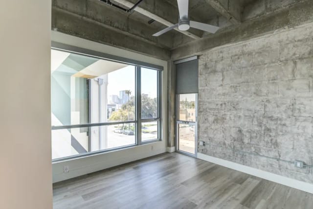 Modern Sun Room at Bankers Hill Club, featuring large windows for meetings and events.