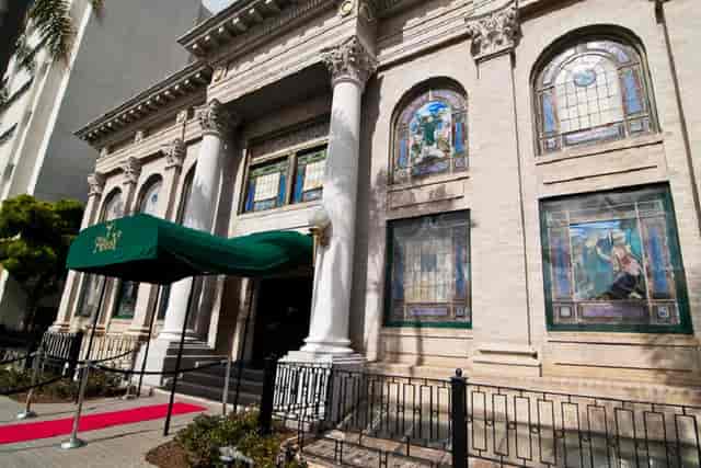 Elegant balcony with stained glass at The Abbey, perfect for upscale weddings and events.