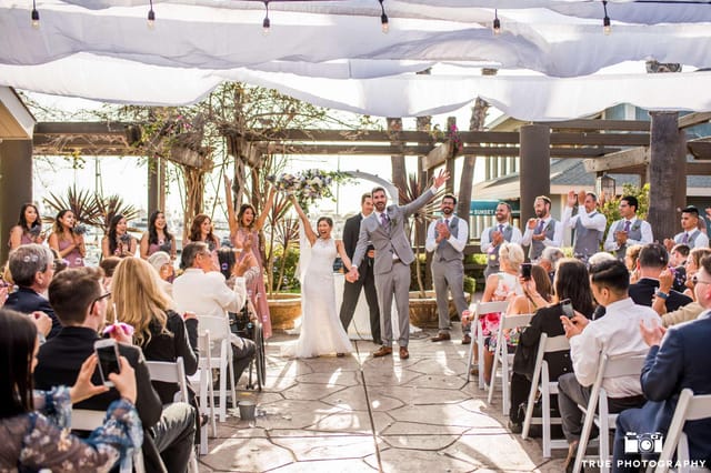 "Elegant outdoor wedding ceremony at Marina Village Conference Center, Ranch Events."