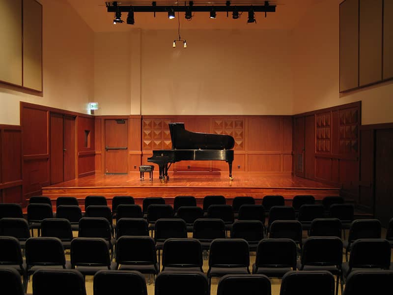 Marvin Laser Recital Hall with grand piano, perfect for intimate concerts and recitals.