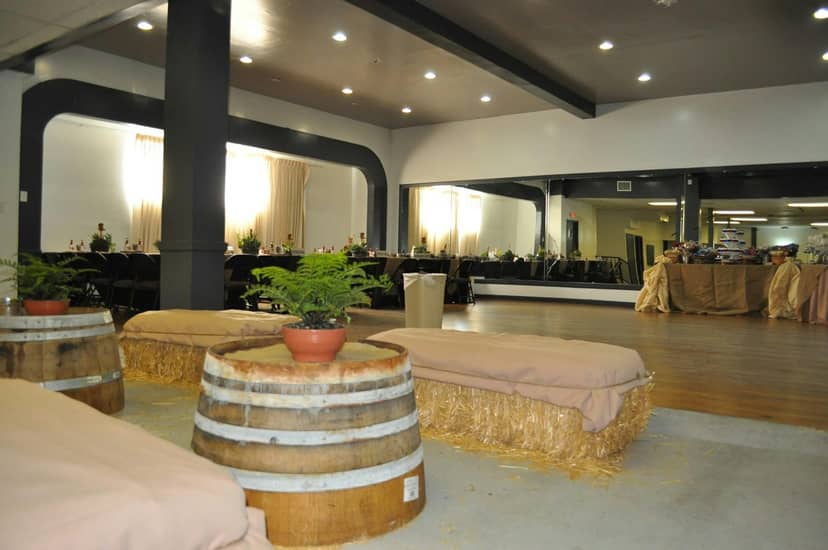 Versatile event venue with rustic barrel seating at South Bay Dance Center for casual gatherings.