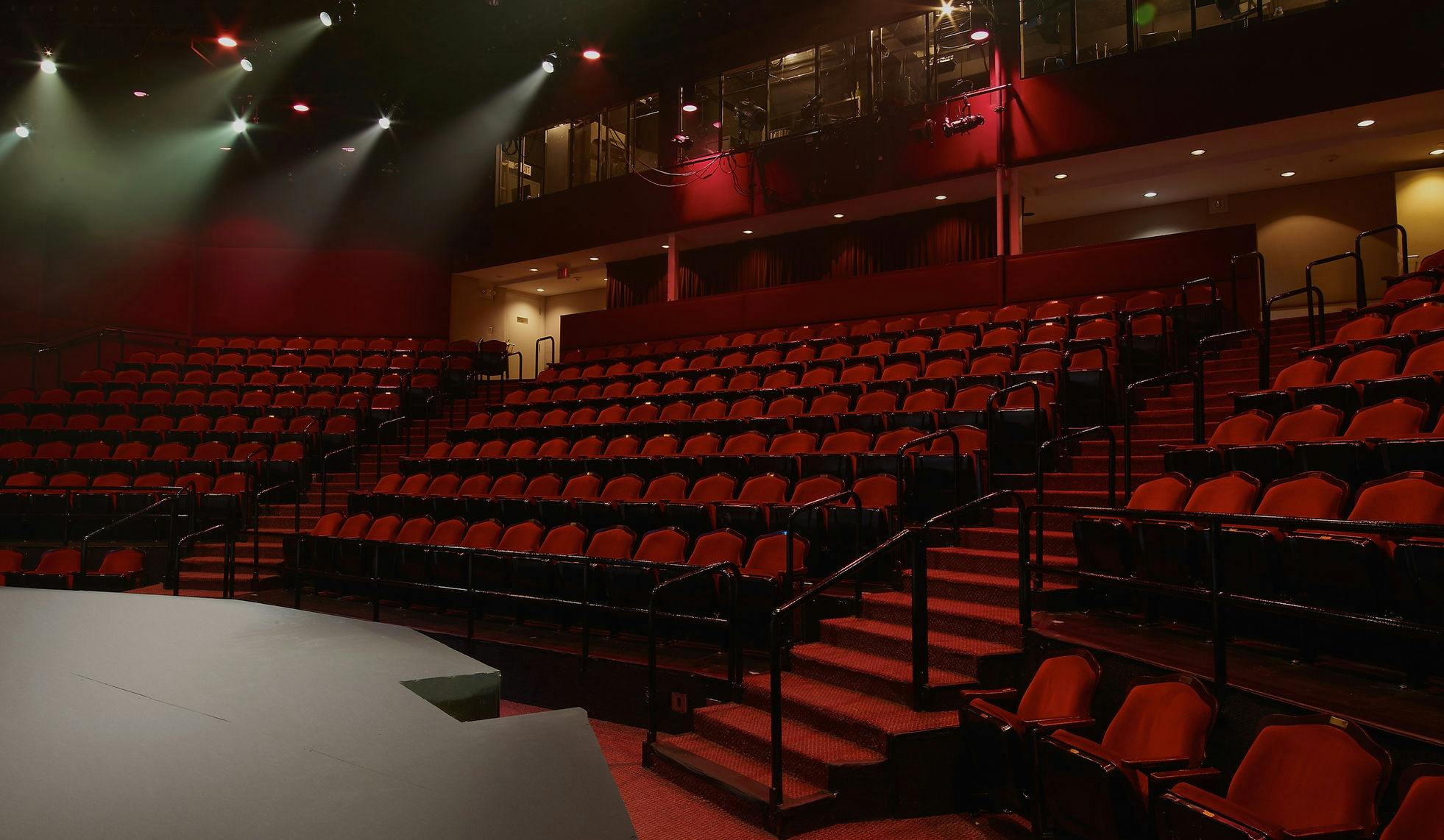 Thrust Stage at The Colony Theatre with tiered seating for events and presentations.