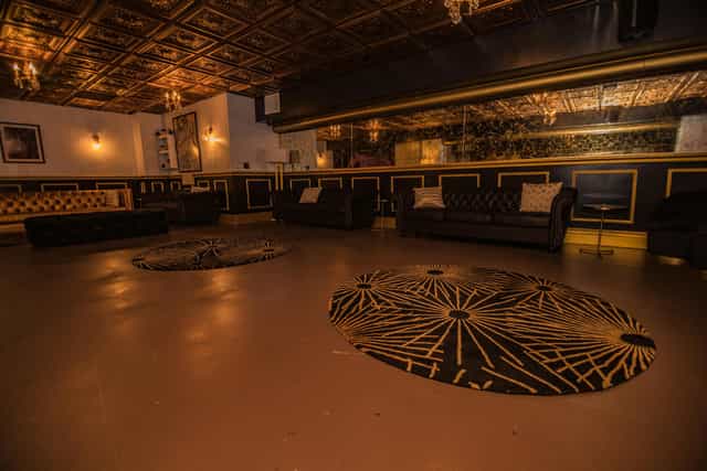 Main Ballroom at Hollywood Palladium with elegant leather seating for events and gatherings.