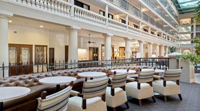 Spacious atrium at Embassy Suites LAX, perfect for networking events and meetings.