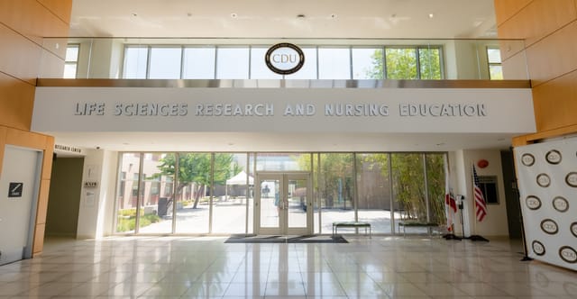 CDU Campus entrance with large windows, ideal for healthcare conferences and workshops.