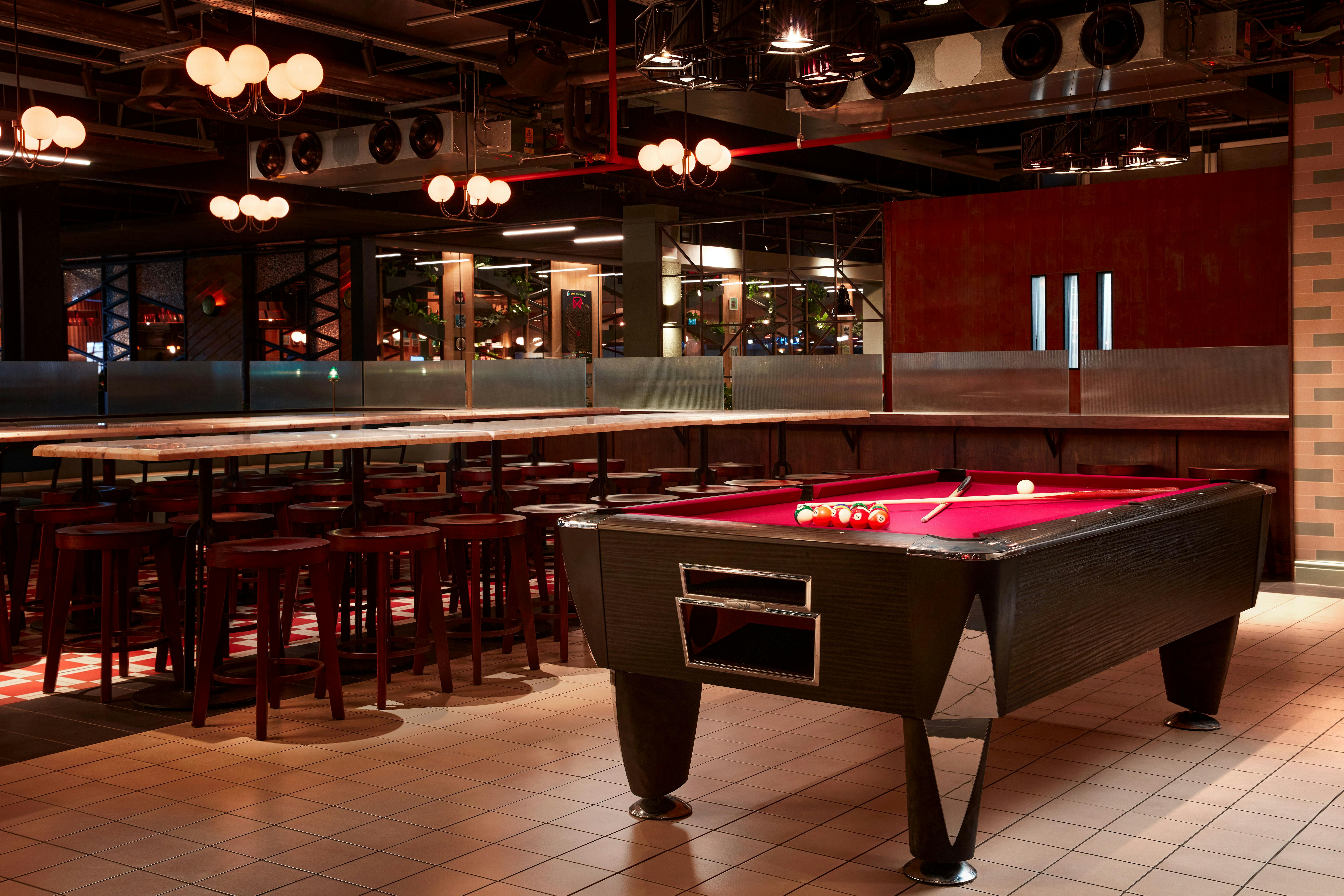 Stylish pool room in Arcade Battersea, ideal for networking events and team-building.