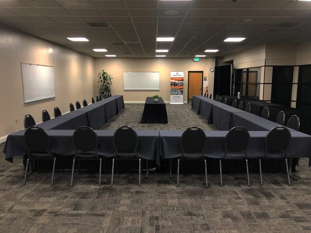U-shaped meeting room in Business Expo Center, ideal for collaborative discussions.