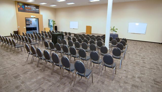 Presentation Room at Business Expo Center, featuring rows of chairs for workshops and presentations.