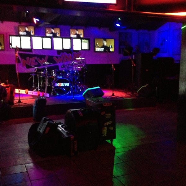 Vibrant event space at New Wave Restaurant & Bar for live performances and parties.