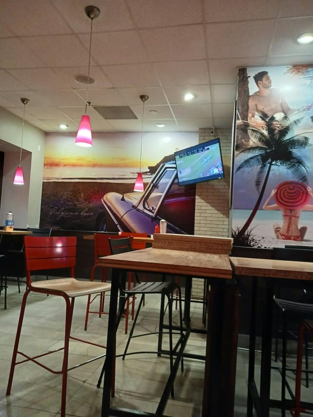 Main Room at New Wave Restaurant: casual dining with warm lighting, perfect for events.