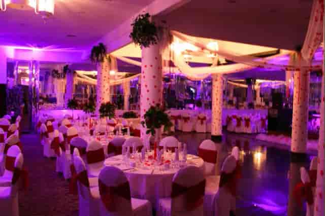 Elegant Epoca Hall event space with floral decor, perfect for weddings and corporate events.