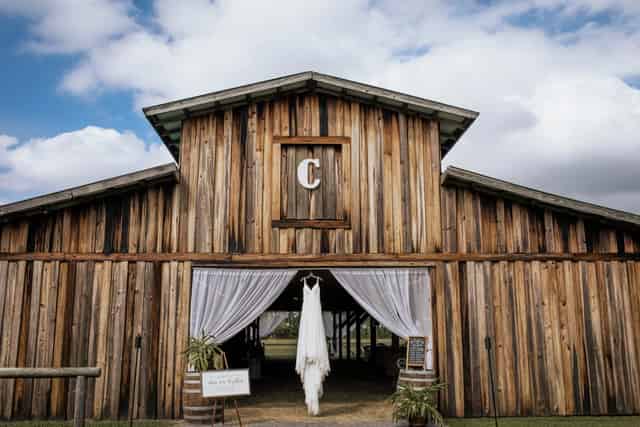 Hitching Post Barn Wedding Backdrop