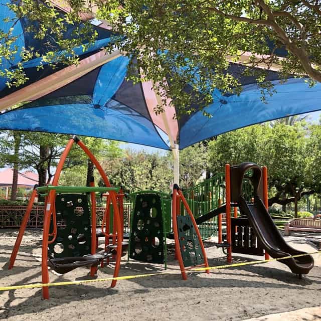 Vibrant playground with colorful canopy for family-friendly events in Live Love Play LA.