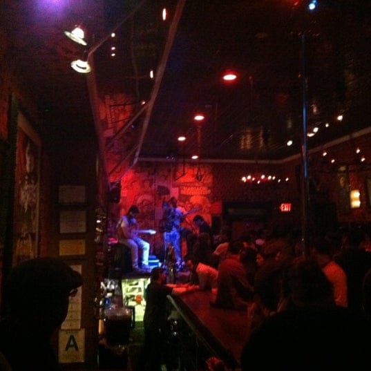 Vibrant Eastside Luv Wine Bar with stage, perfect for lively events and gatherings.