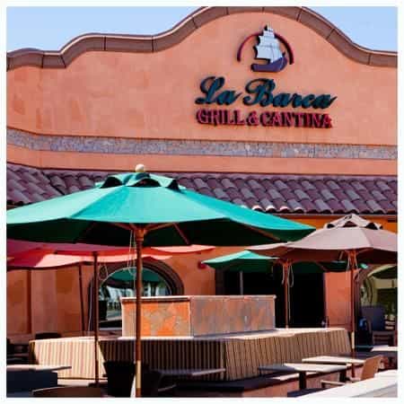 La Barca Grill & Cantina outdoor venue with vibrant umbrellas for casual events.