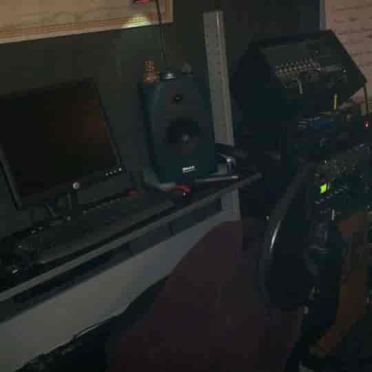 Recording studio setup with audio equipment for seamless live event management.