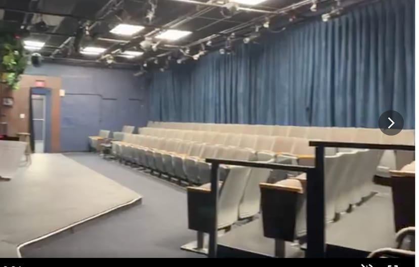 On Stage Playhouse with tiered seating, ideal for performances and conferences.